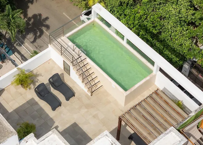 Piscina en la cima Lujoso apartamento en Playa del Carmen