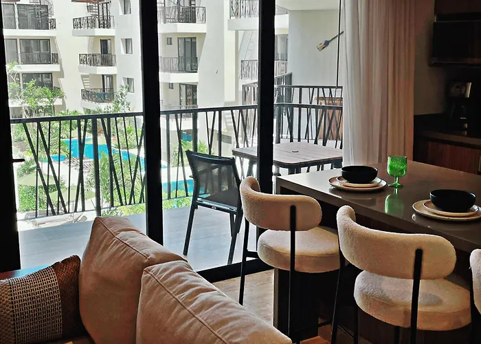 1 Bedroom With King Bed And Balcony With Amenities View