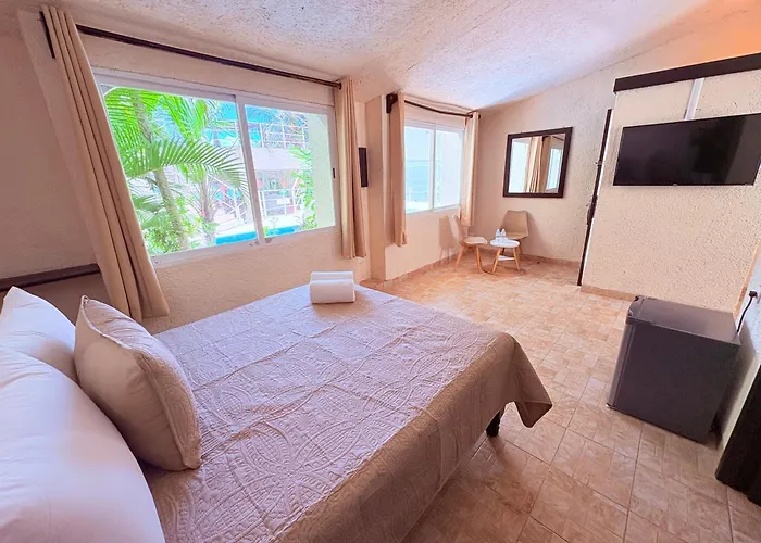 Condohotel Luciana Deluxe Queen Oceanview Suite With Sofabed